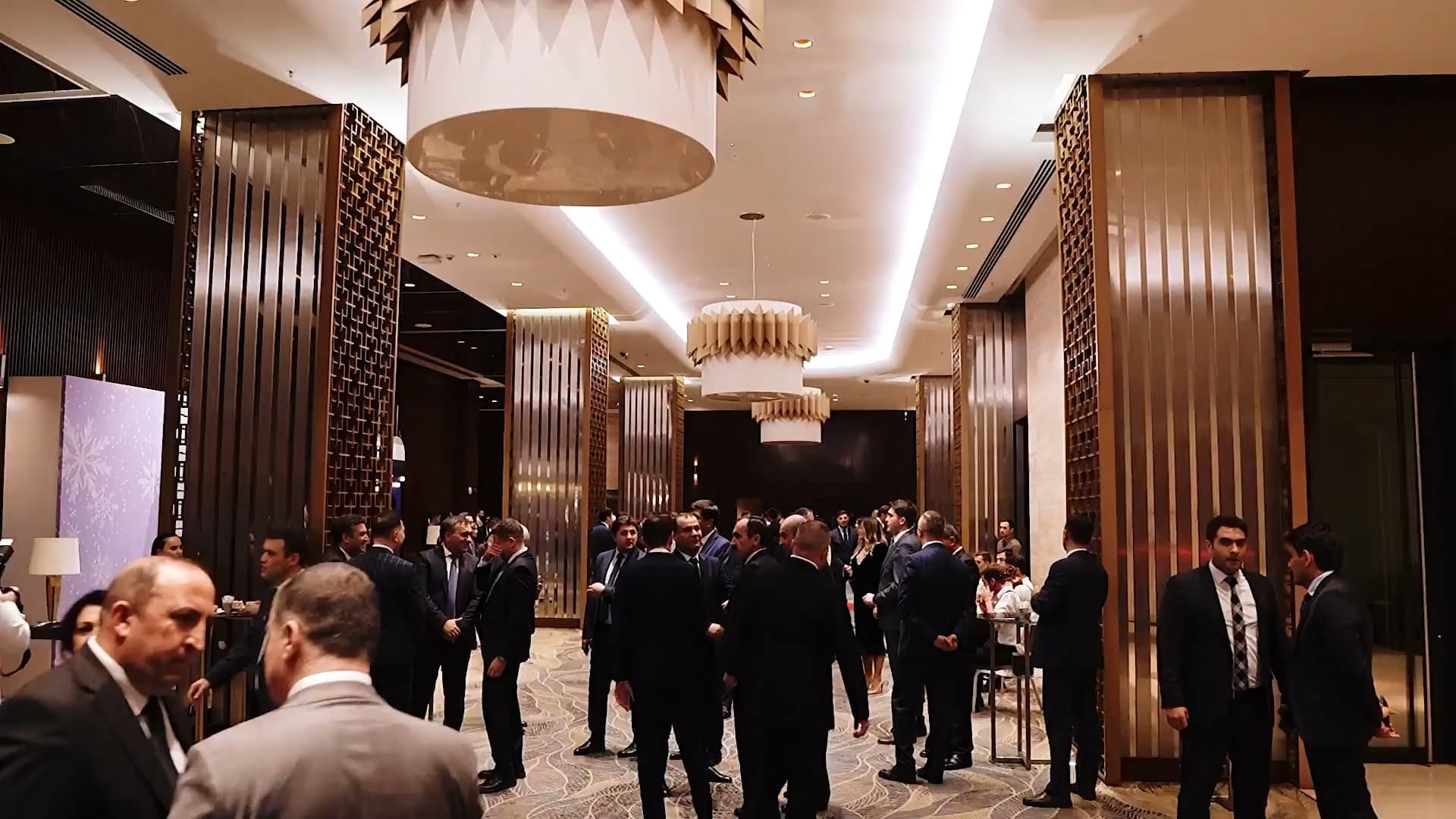 Guests connecting at a corporate evening reception
